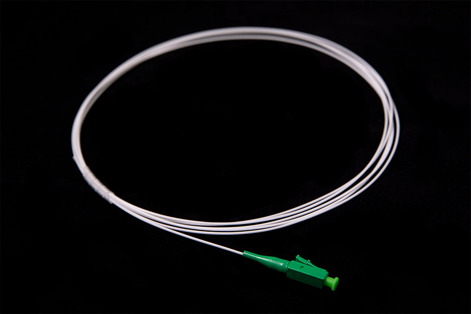 Pigtail LC/APC Singolo Modo 9/125 G657-A2 Connettore Verde Guaina LSZH TIGHT Bianco 2 Metri.jpg